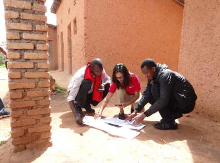 Drishtie Patel - Helping a team find their location for mapping in Rural Rwanda